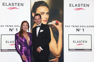 Sängerin Anita Hofmann mit QUIRIS-Geschäftsführer Dr. Jan-C. Kattenstroth am ELASTEN®-Stand